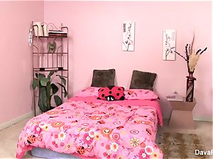 Dava and Lily Cade have joy on a pink bed